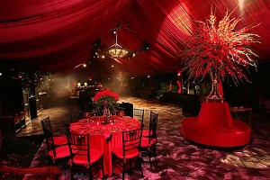 interior of tent draped entirely in red on a private estate, may not be copied